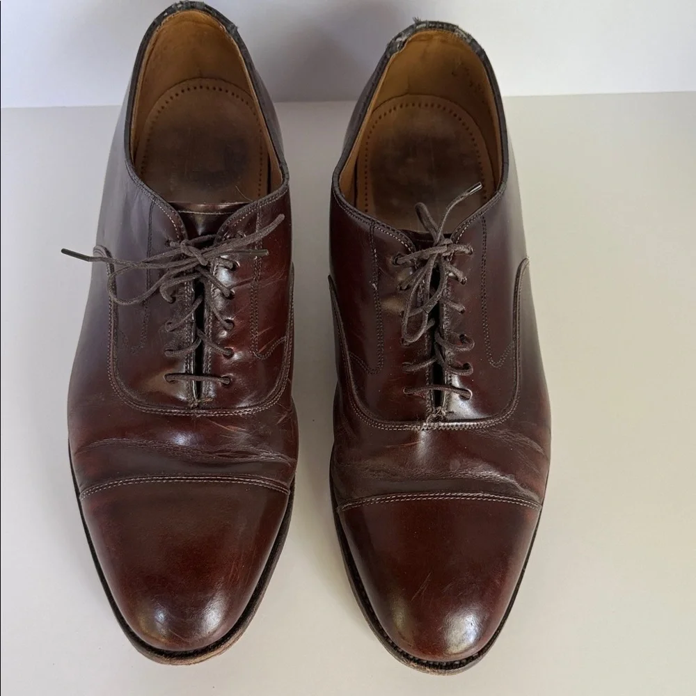 Johnston and Murphy men’s size 10 Optima Oxford, 100% leather lace up cap toe.‎